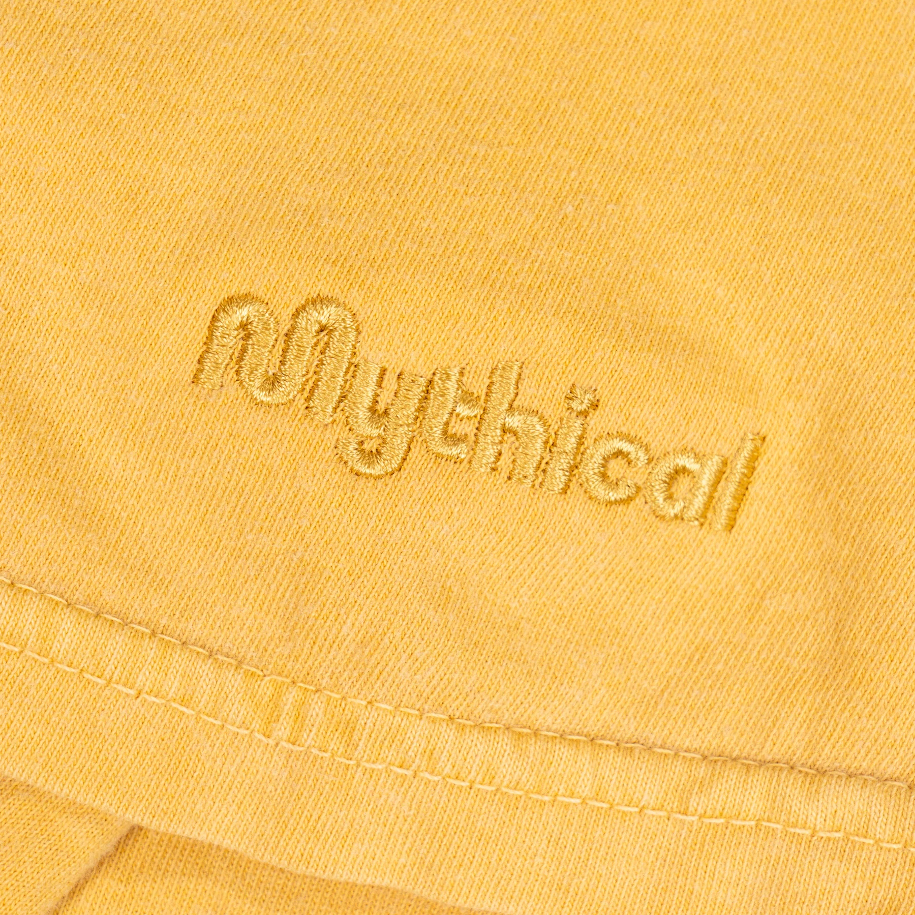 1039-mythical-embroidered-tee-mustard-3.webp Mythical Embroidered Tee (Mustard)